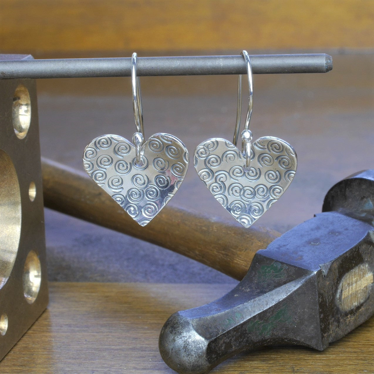 Making textured silver drop earrings jewellery workshop Derbyshire