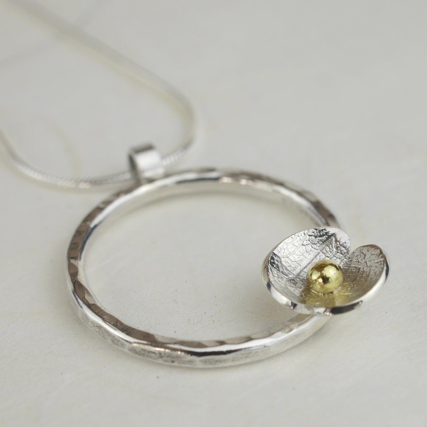 Silver Circle and Flower Necklace